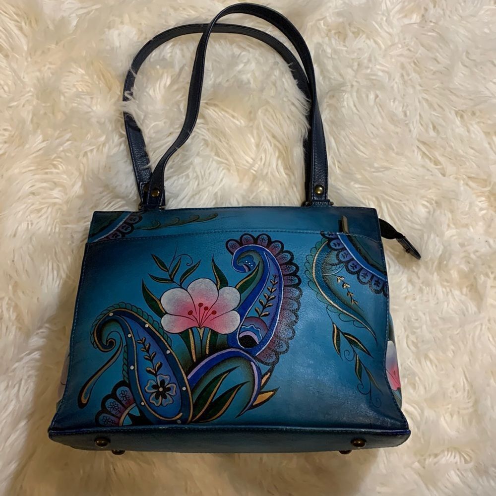 With built-in wallet card pockets/zipper pockets